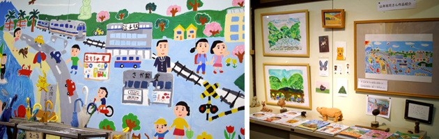 壁画の写真、廊下の山本さんコーナーの写真